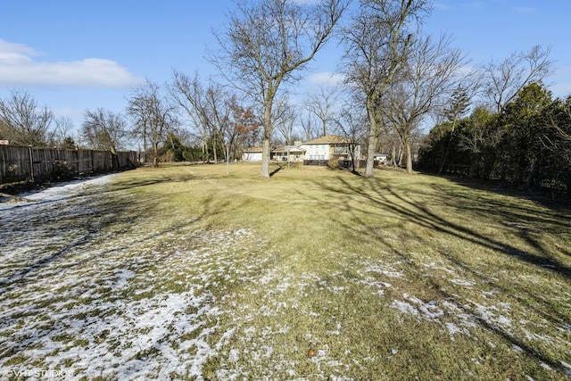 view of yard covered in snow