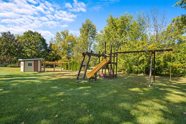 view of yard featuring a storage shed and a playground