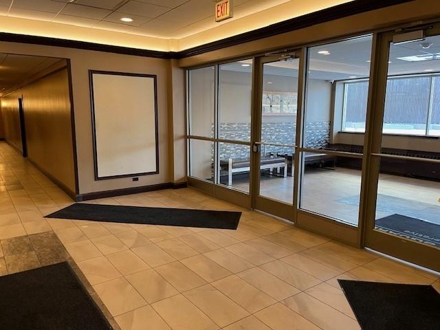 doorway featuring light tile patterned floors