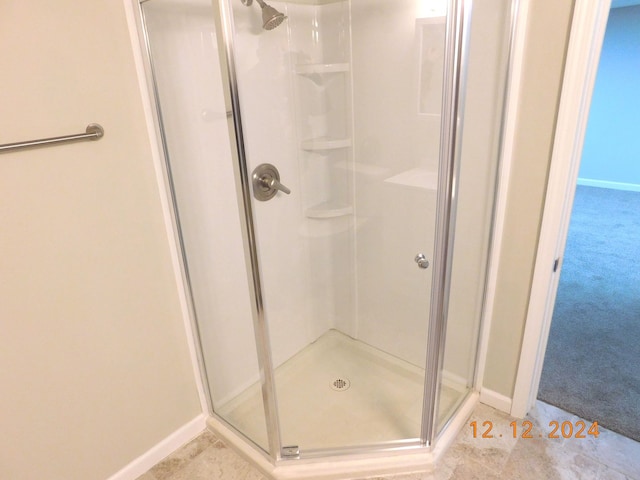 bathroom with walk in shower