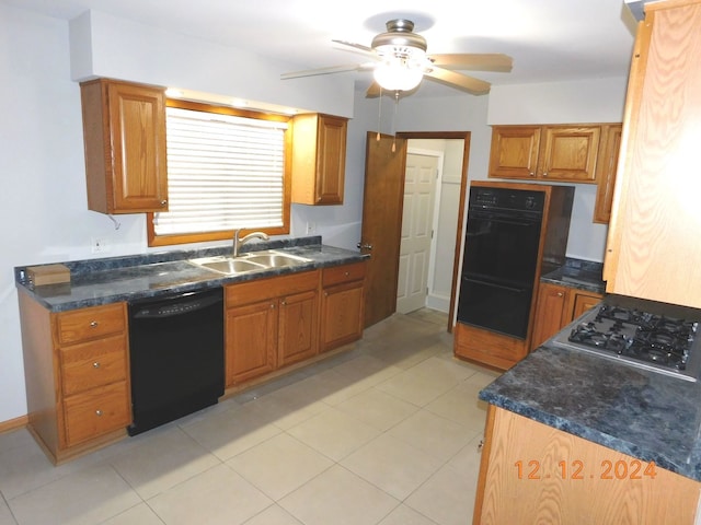 kitchen featuring light tile patterned flooring, ceiling fan, sink, and black appliances