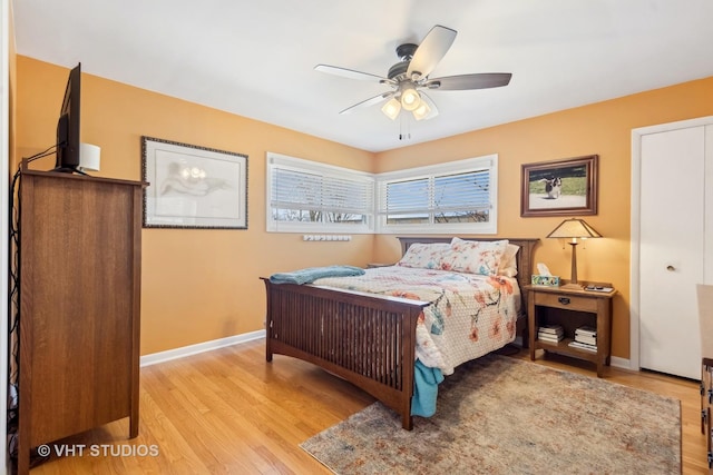 bedroom with ceiling fan and light wood-type flooring