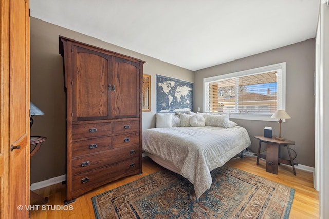 bedroom featuring light wood-type flooring