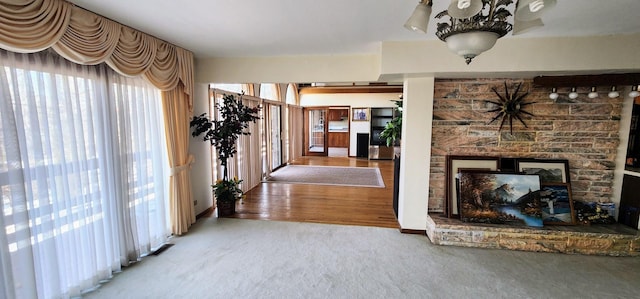 unfurnished living room with carpet flooring