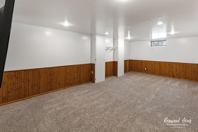 basement with light colored carpet