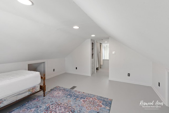 bedroom with lofted ceiling