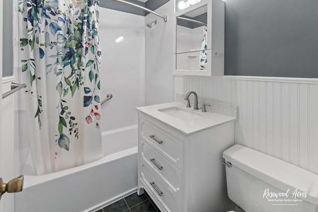 full bathroom with toilet, tile patterned floors, shower / bath combo, and vanity