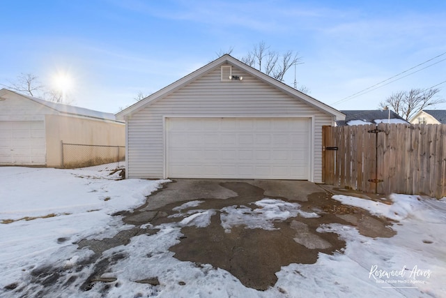 view of snow covered garage