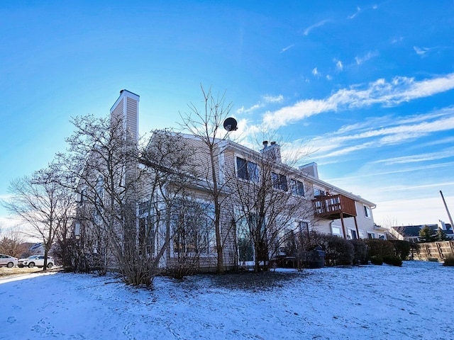 view of snow covered property