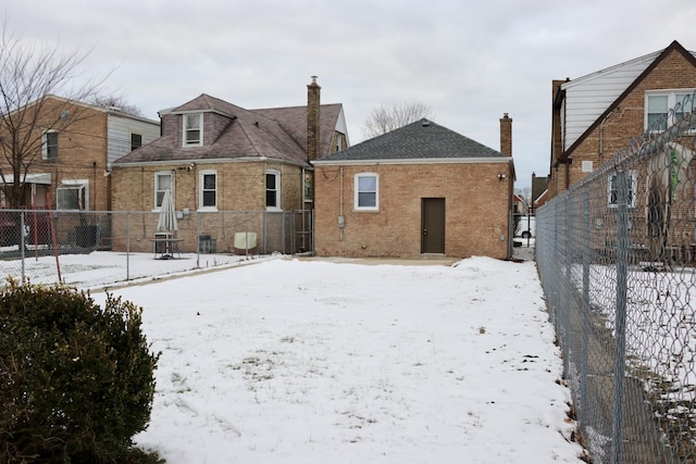 view of snow covered property