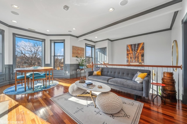 living room featuring crown molding and wood-type flooring