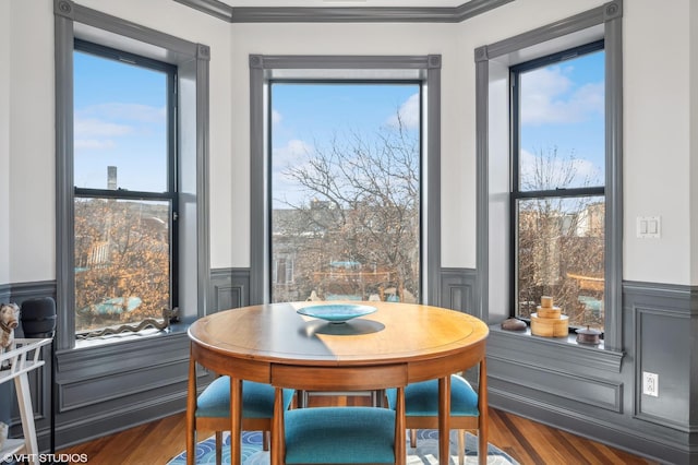 dining room with hardwood / wood-style floors