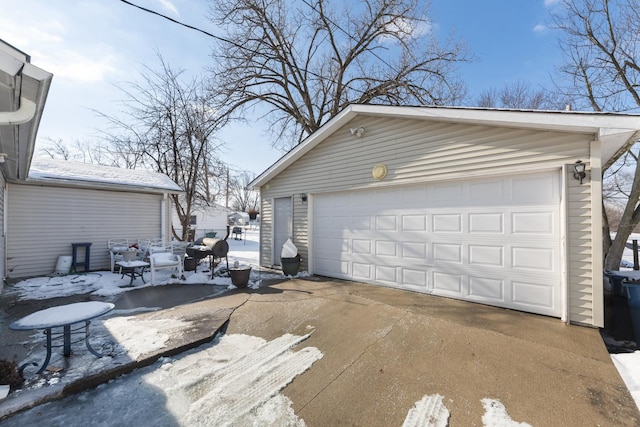 view of snow covered garage