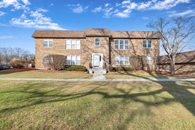 view of front of house with a front lawn