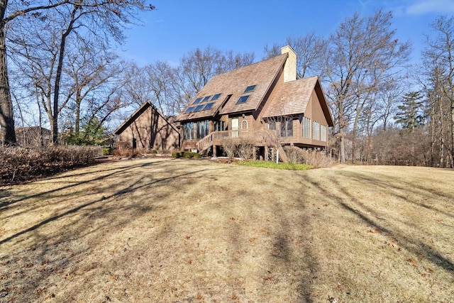 back of house with a yard