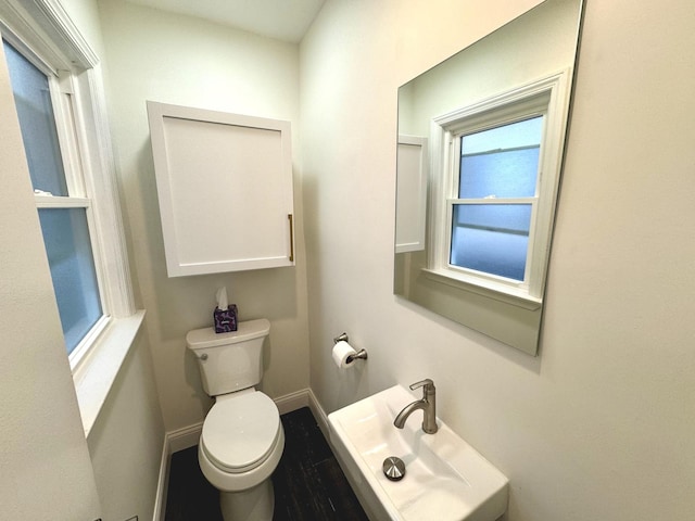 bathroom with sink and toilet