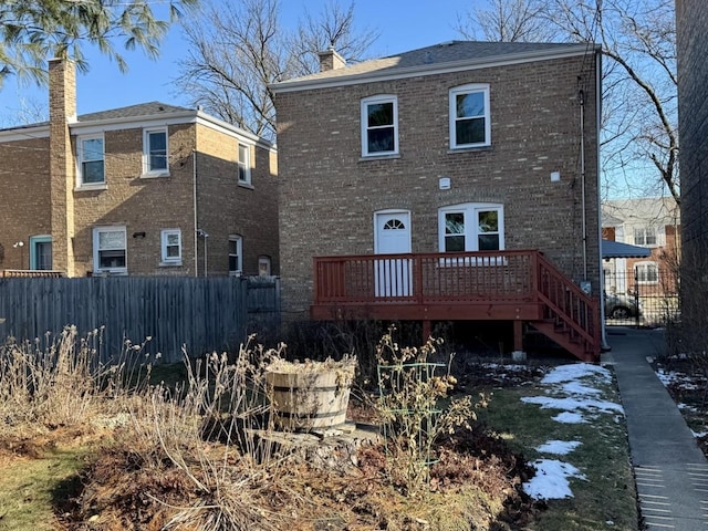 rear view of property with a deck