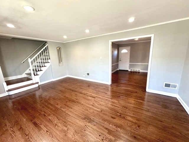 unfurnished room with dark wood-type flooring and crown molding