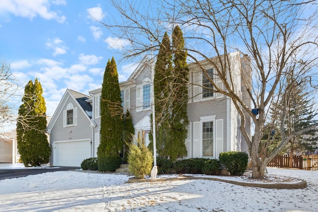 view of front of property featuring a garage