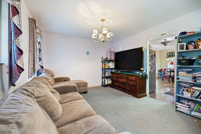 living room featuring a notable chandelier and light carpet