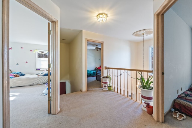 hallway featuring carpet floors