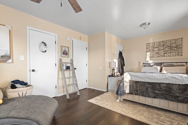 bedroom featuring ceiling fan and dark wood-type flooring