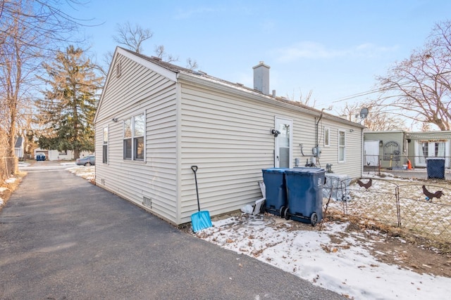 view of snow covered property