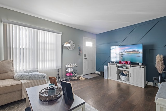 living room featuring dark hardwood / wood-style flooring