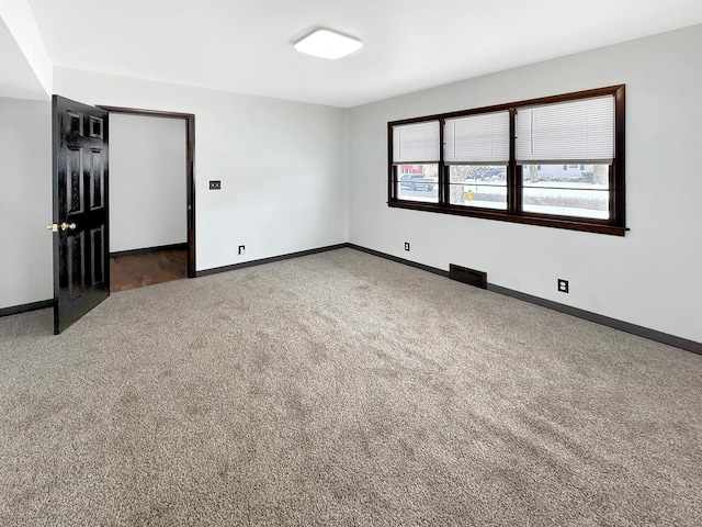 view of carpeted spare room