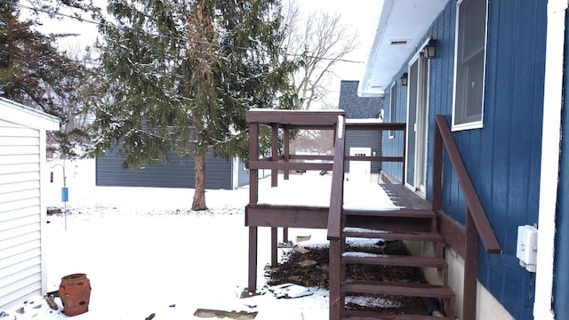 view of snow covered deck