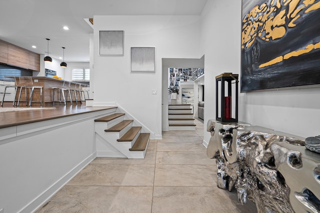 entryway featuring light tile patterned floors