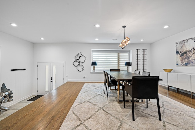 dining space featuring light hardwood / wood-style floors