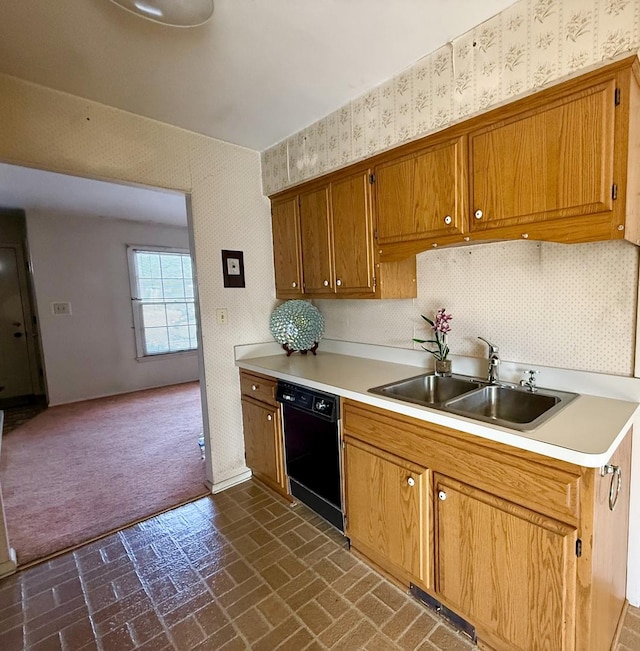 kitchen featuring dishwasher and sink