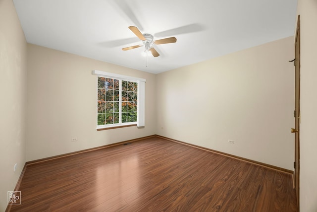 unfurnished room featuring hardwood / wood-style floors and ceiling fan