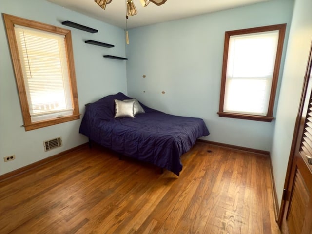 bedroom featuring hardwood / wood-style flooring