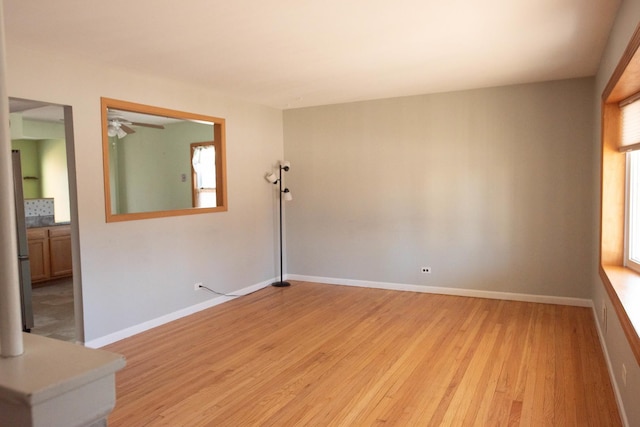 spare room featuring light hardwood / wood-style flooring