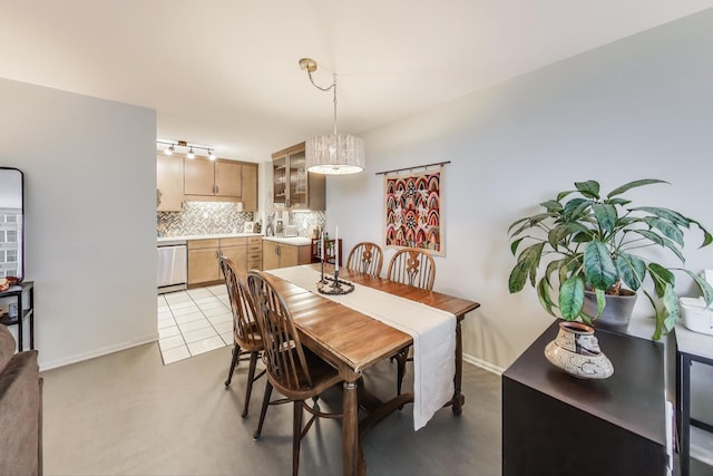 dining space featuring light tile patterned floors