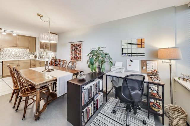 dining space featuring sink