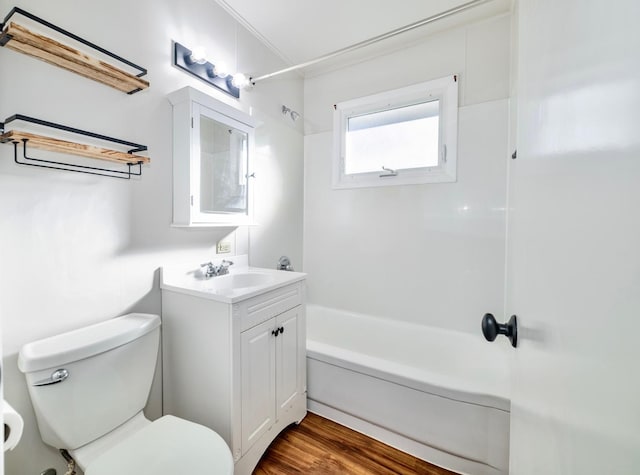 full bathroom with toilet, vanity, shower / bathing tub combination, and hardwood / wood-style floors