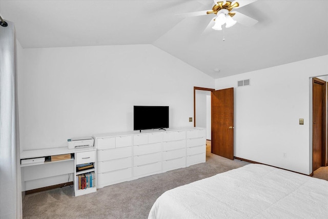 bedroom featuring ceiling fan, visible vents, vaulted ceiling, and light colored carpet