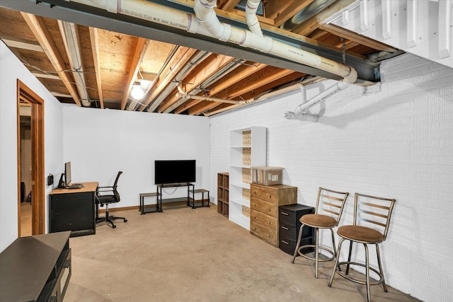 office area with concrete floors