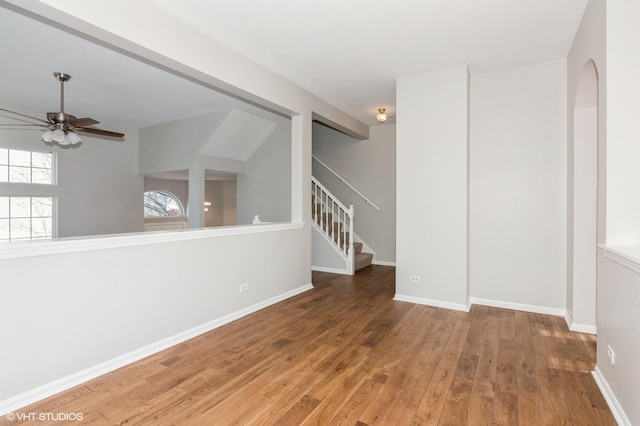 spare room with hardwood / wood-style floors and ceiling fan