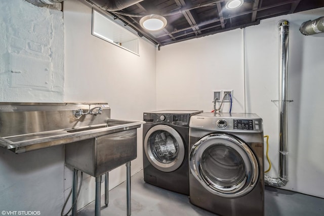 laundry room featuring laundry area and washing machine and dryer