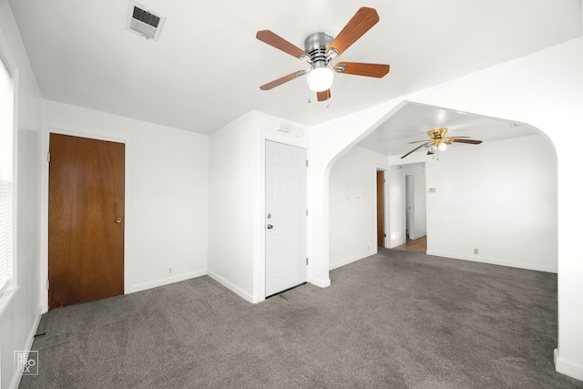 carpeted empty room with ceiling fan