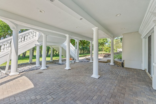 view of patio with stairway