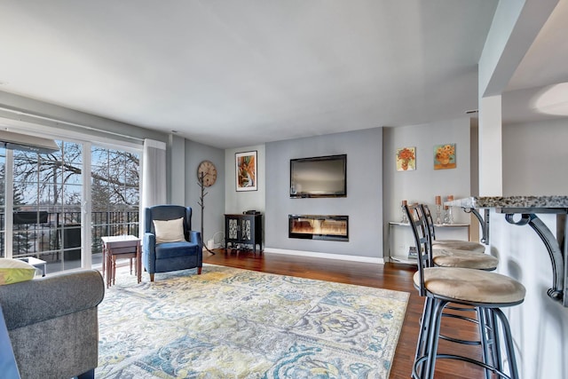 living room with dark wood-type flooring