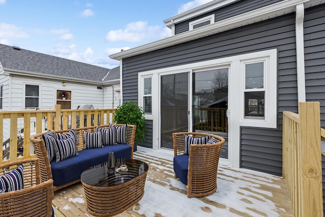 wooden deck featuring outdoor lounge area