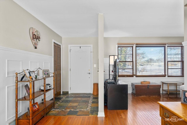 entrance foyer with dark hardwood / wood-style floors