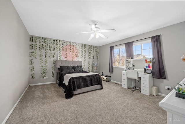 bedroom featuring ceiling fan and light carpet