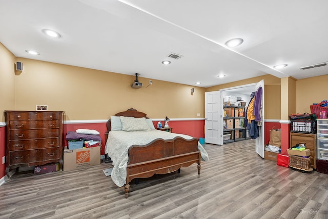 bedroom featuring light wood-type flooring